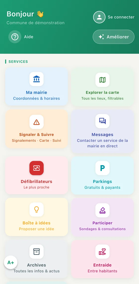 Écran d'accueil de l'application : les services de la commune en tuiles — ma mairie, carte, signalements, messages, défibrillateurs, parkings, boîte à idées, participation, archives, entraide.
